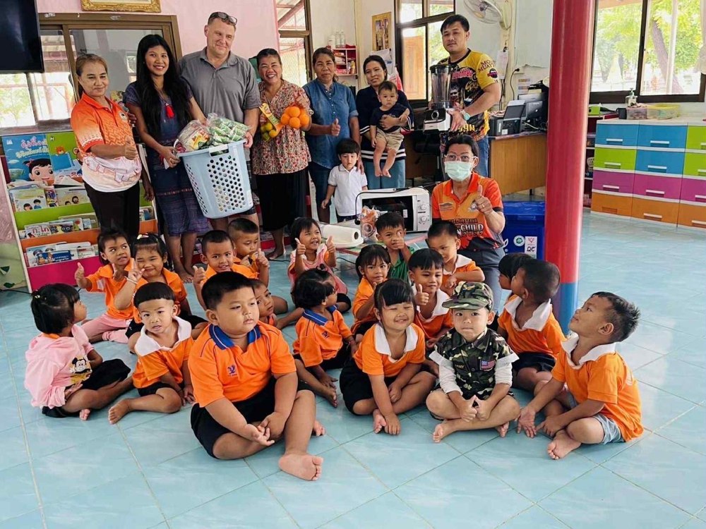 Ploy visiting a village school in Isan